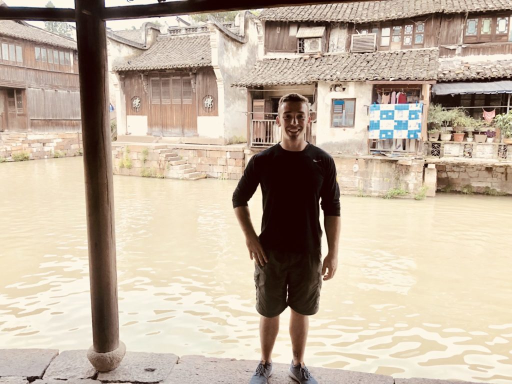 Sydney Spiegel pictured in Wuzhen, China. Wuzhen is an ancient town famous for its canals, craftmanship of local goods, and the dying of a special blue fabric that was used by the common people who could not afford silk.