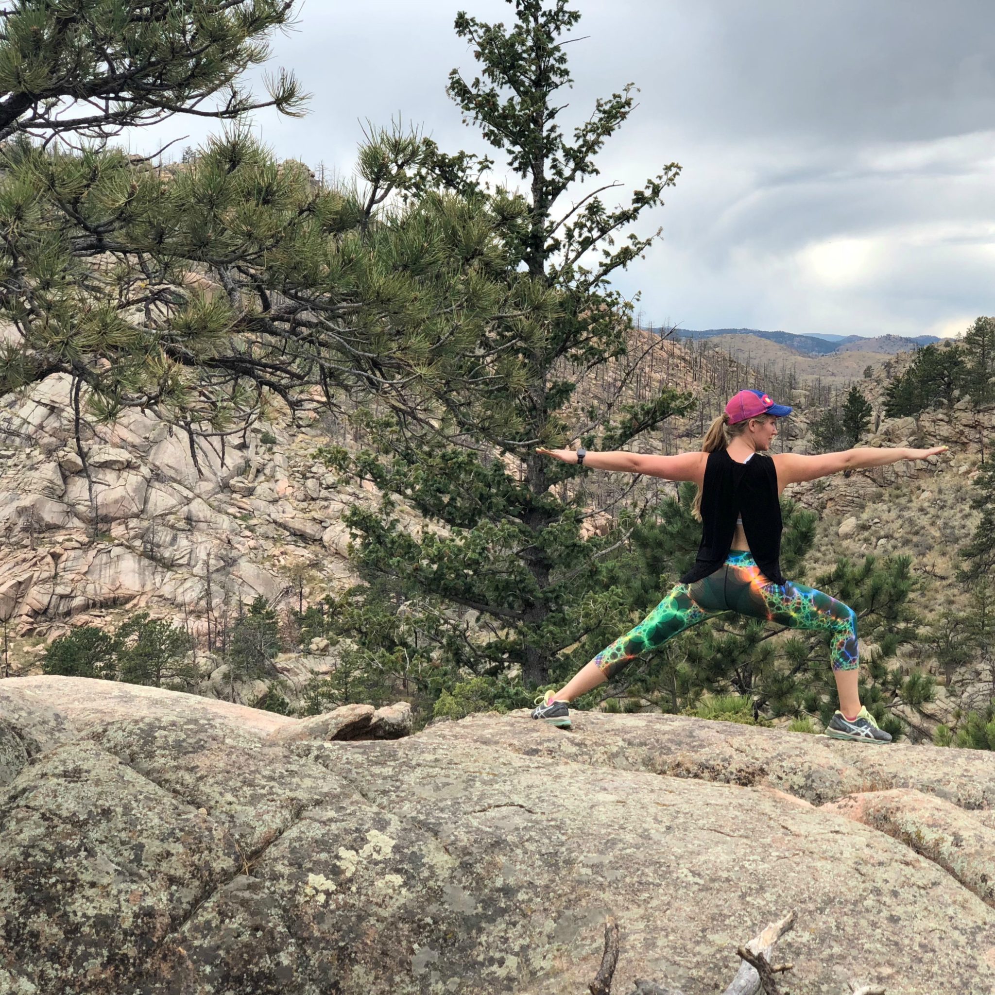 Toni-Lee Viney does a Warrior II pose at Grey Rock