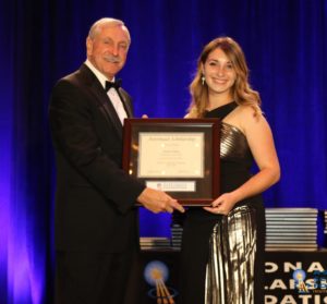Photo of Eliaz accepting the Astronaut Scholarship Award from astronaut Curt Brown. 