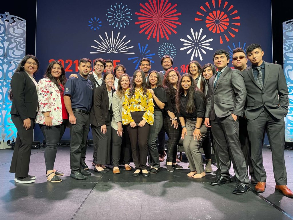 Members of the Colorado State University chapter of the Society of Hispanic Professional Engineers gather onstage to accept their award as the SHPE National Chapter of the Year at the 2021 SHPE National Convention, November 14, 2021.