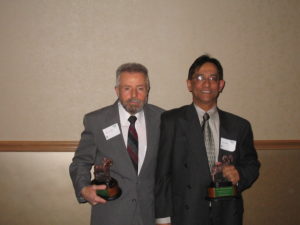 Emeritus Professors Vince Murphy and Naz Karim pose for a photo as each won a Best Teacher Award from Colorado State University in 2005.