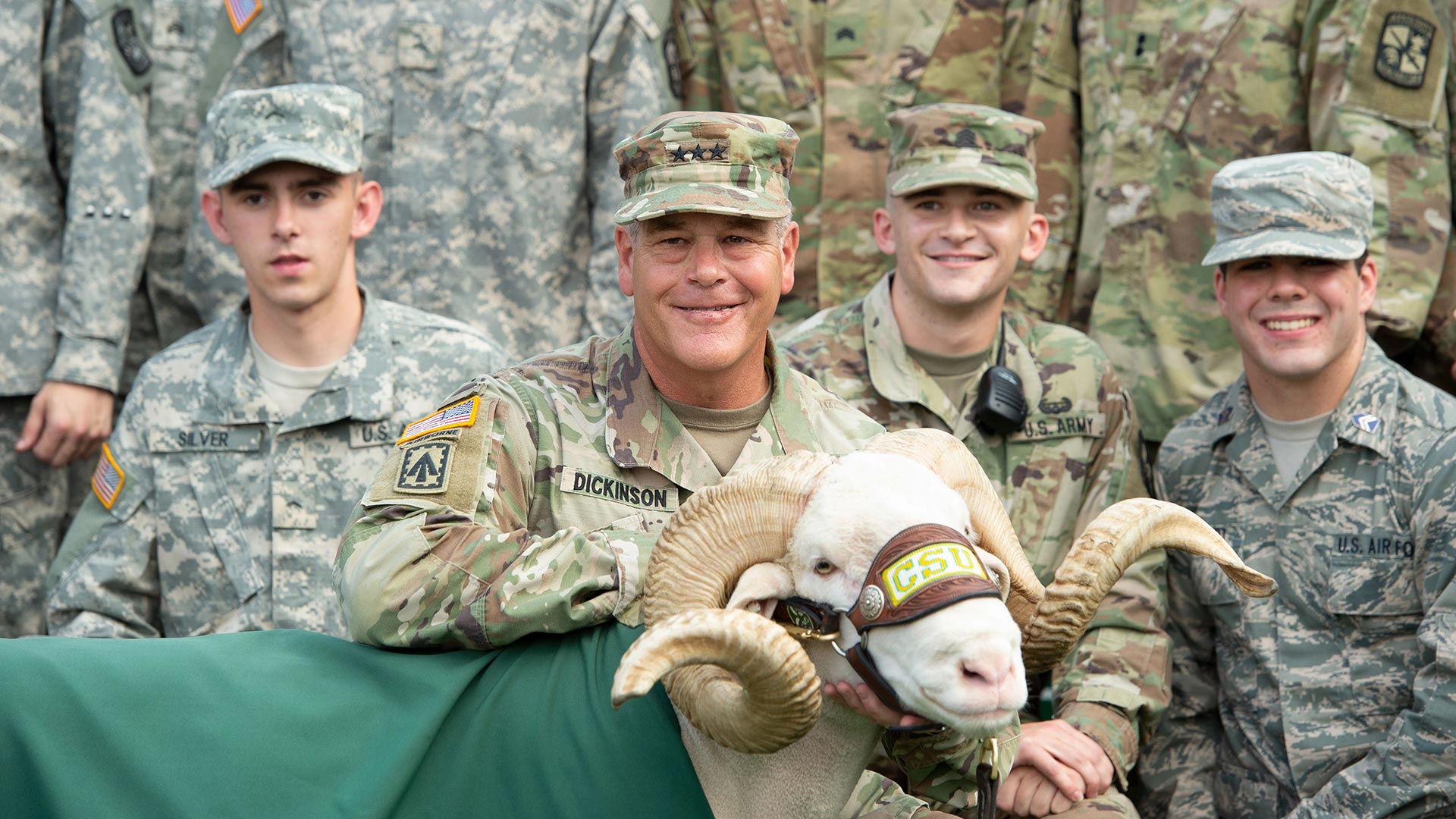 U.S. Army General James Dickinson with CAM the Ram and students