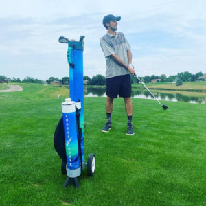 Killian Clear on the golf course with his Courserover golf bag