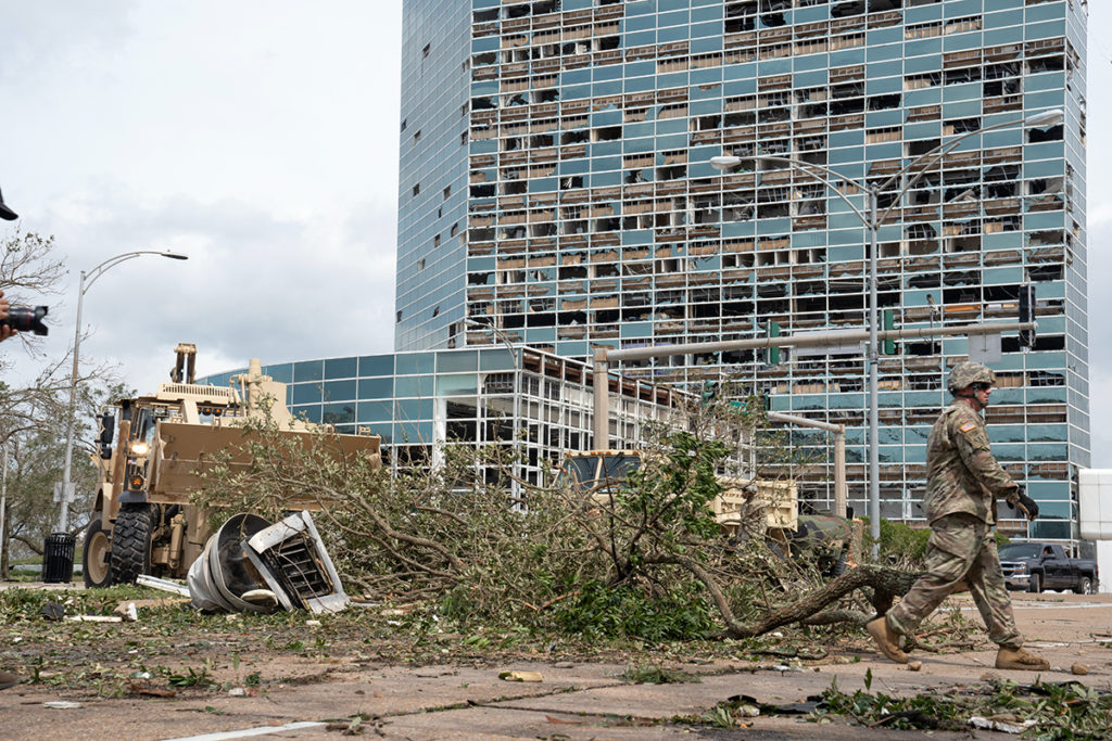A photo showing storm damage to a large office tower.
