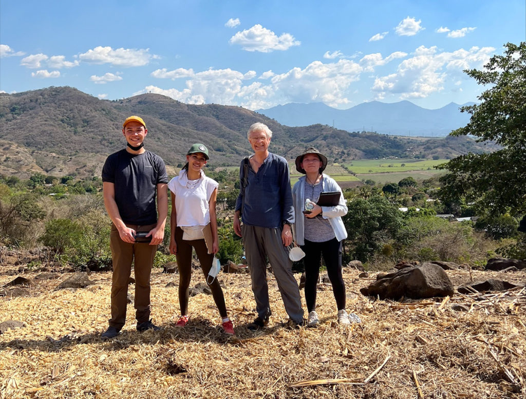Members of the RWB group stand on the site of the new water tank in El Salvador