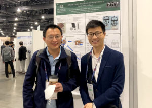Zhao (l) and Sun (r) at the ICRA conference in 2022.