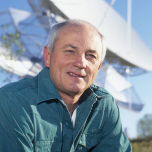 Vonder Haar posing for a 2005 photo with a CIRA satellite dish in the background.