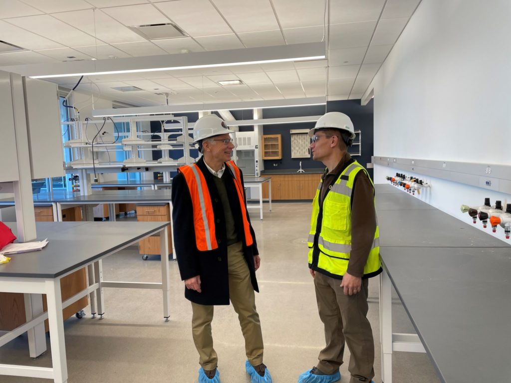 A picture of two men - Ken Reardon and Matt Kipper - standing in a laboratory at Spur.