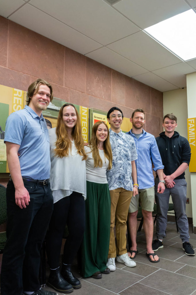 CSU engineering students Kyle Curtis (CBE), Kaylee McCarthy-Zayach (CBE), Mackenzie Lucas (CBE), Ethan Ahuna (CBE), and Isaac Reaves (ECE) work with Jeffrey Callaway, Director of the Fermentation Science and Technology Program at Colorado State University, in the Lory Student Center's Ramskeller, April 13, 2023.