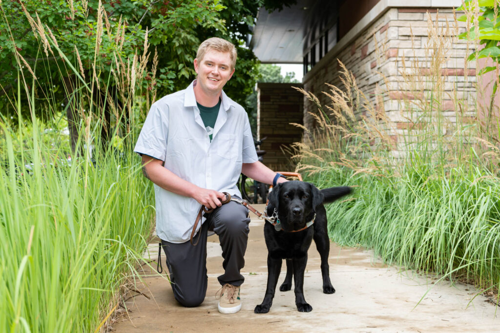 Environmental engineering student Robert Lamm and his guide dog, Fletcher.