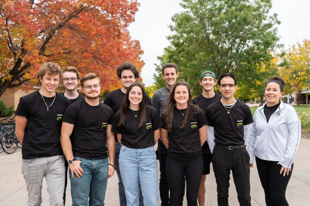 Members of Colorado State University's 2023 Mechanical Engineering Executive Board pose for a photo together outdoors.
