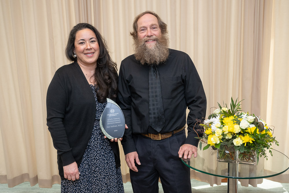 Award winner Star Sullivan stands with Interim Vice Provost for Undergraduate Affairs Tom Siller at the annual CSU Provost Awards Luncheon. April 10, 2024